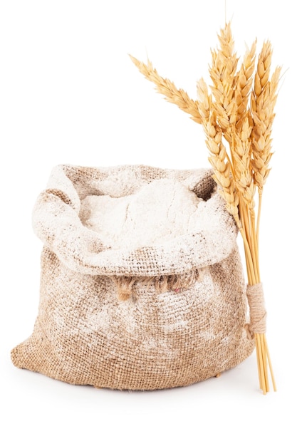 Foto farina in sacchetto di juta con spighe di grano