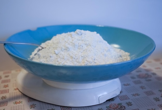 Flour dish on a kitchen scale