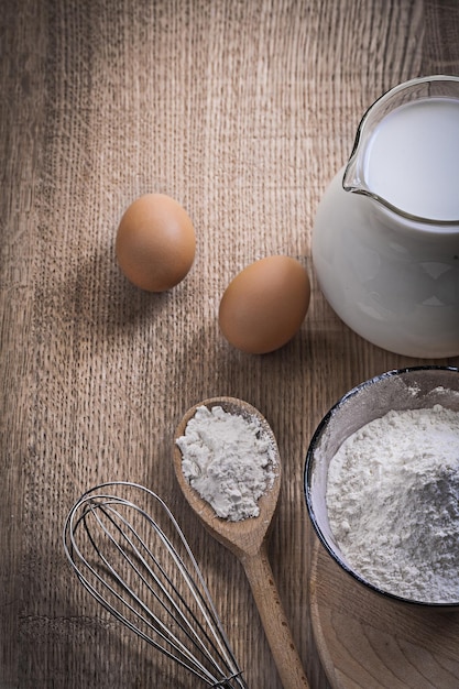 Flour eggs corolla milk in jug