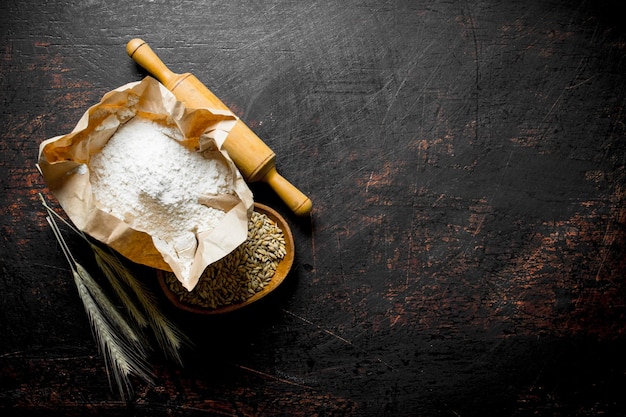 Flour with wheat grain and spikelets