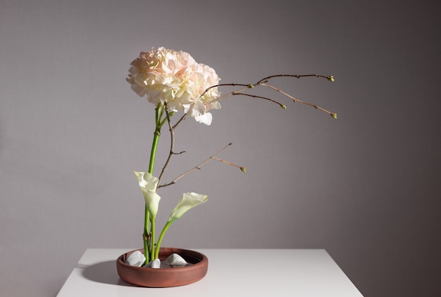 Flower arrangement of hydrangea, calla lilies