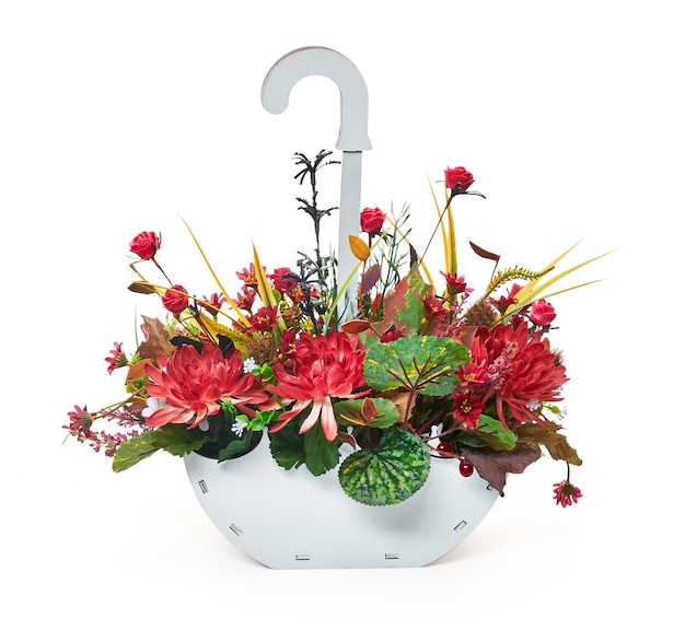 Flower arrangement in a vase in the form of an umbrella