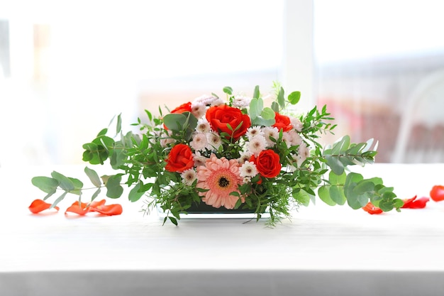 Flower arrangement on a white table