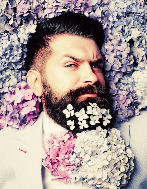 Flower bowtie Elegant business man with classical costume Man in blue suit Bearded man and flower be