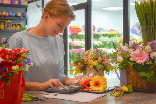 flower delivery service florist seller with a telephone Interior colors