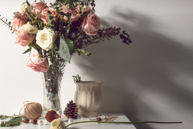 Flower flora rose leaf with vintage light still life with vase and decoration prop