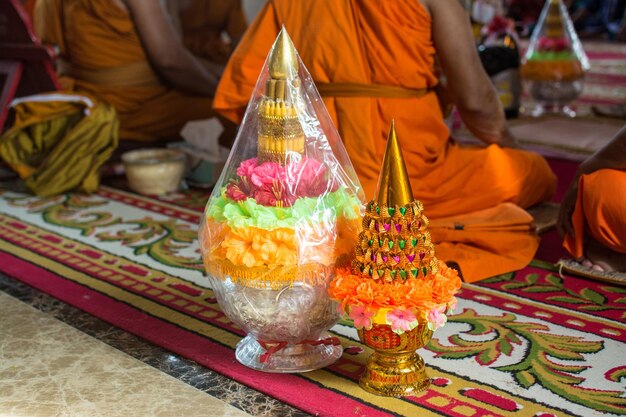 Flower incense candles tray in the church Buddhist ordination ceremony of Buddhist temple in Thailand