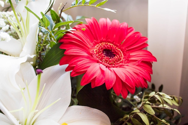 Flower lily and red gerbera in bouquet