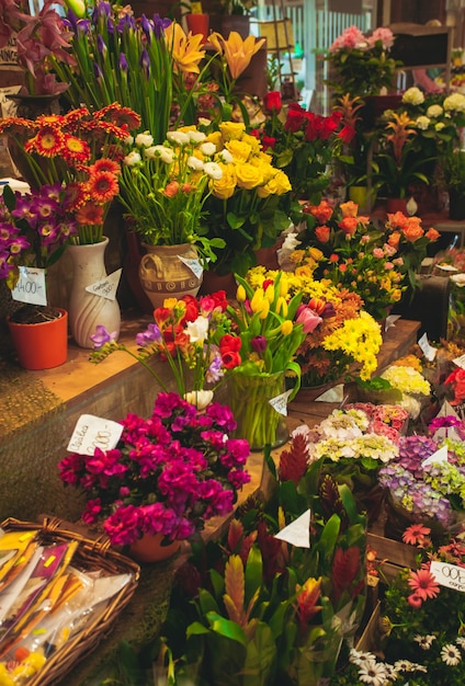 Flower market - beautiful fresh flowers in vases for sale