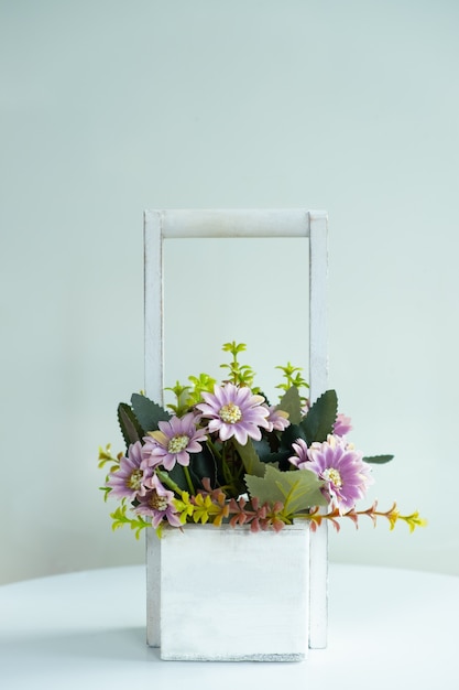 Photo flower pot on white table