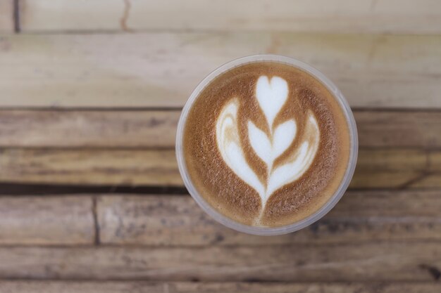 flower shaped pattern of coffee latte art