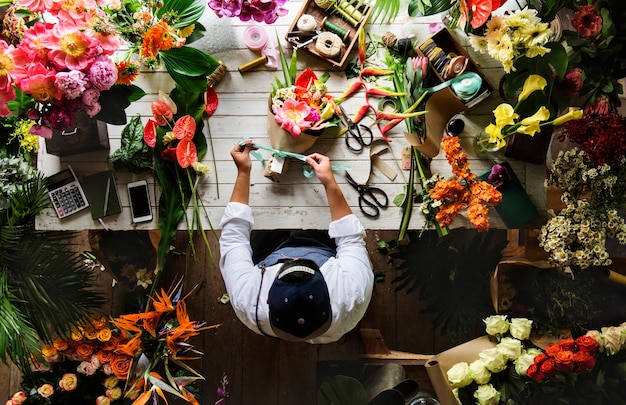 Flower shop business owner working service