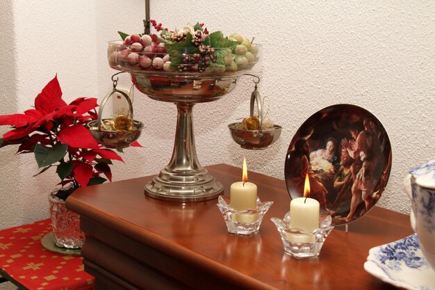 Flower vase on table at home