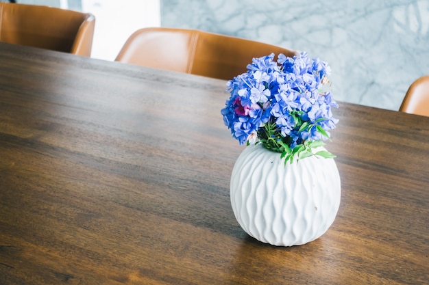 Photo flower vase on table