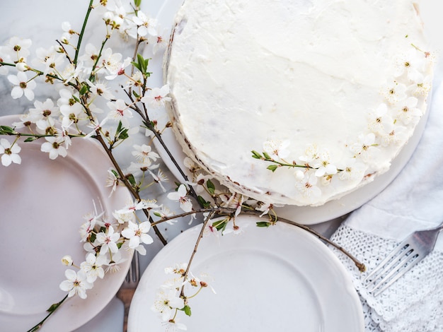 Flowering tree and fresh, homemade cake. Close-up