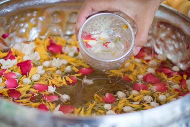 Flowers in a bowl of water Songkran Day Thailand