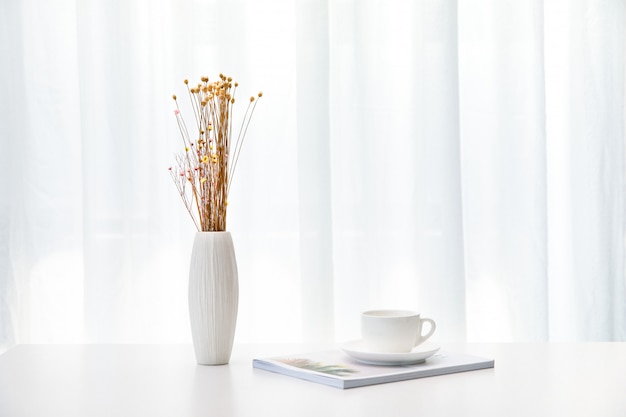 Flowers and coffee on the table