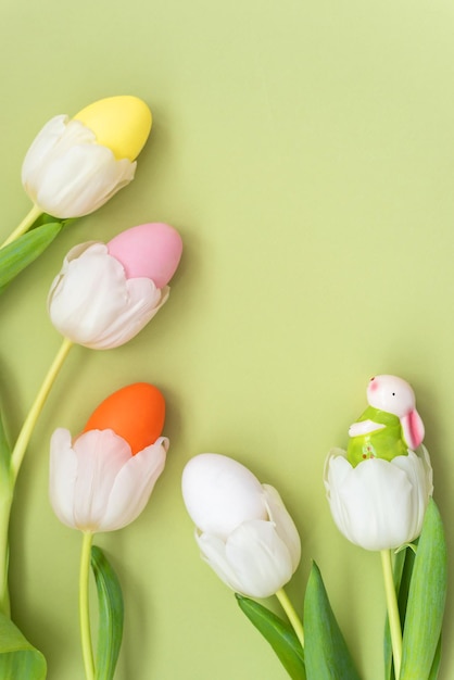 Flowers composition Delicate white tulip flowers on green background Easter day springtime concept F