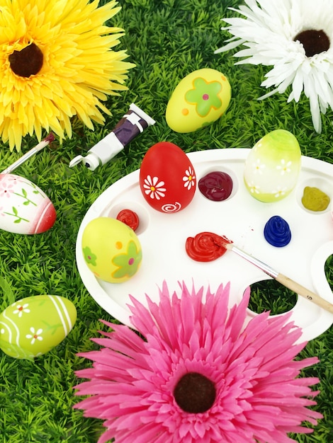 Flowers and Easter eggs on palette