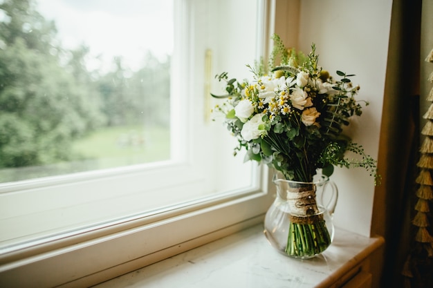 Flowers in front of the windows