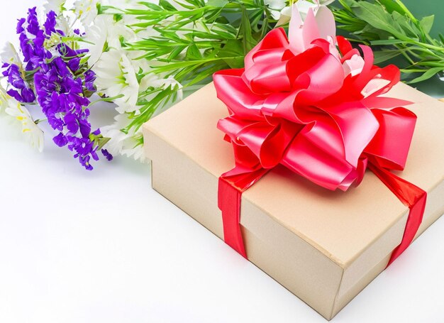 Flowers and gift box isolated on white background and copy space