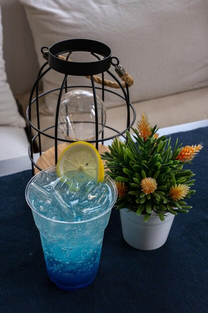 Photo flowers in glass on table