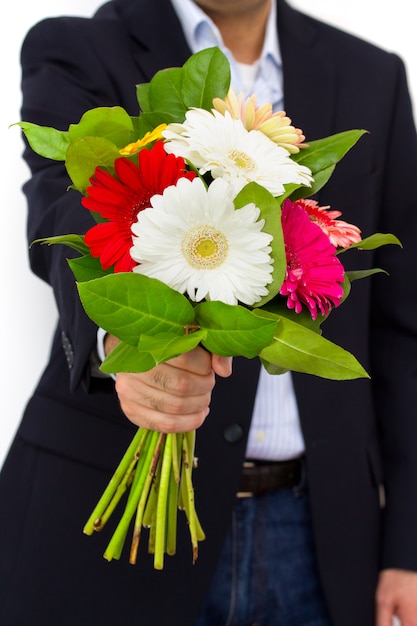 Flowers in hands of man