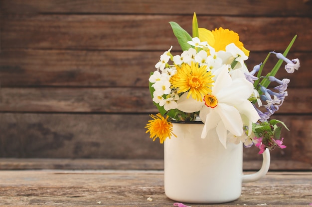  Flowers in an iron mug 