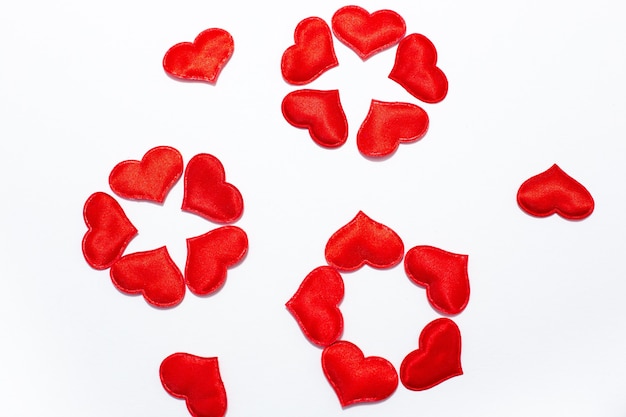 Flowers laid out of red hearts