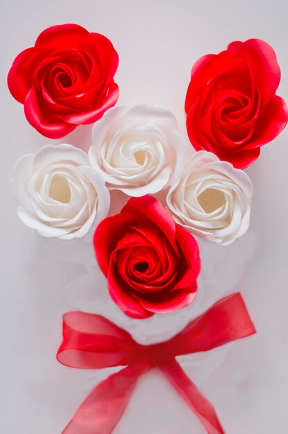 flowers made of soap in the form of a rose on a white background