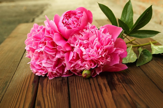 flowers peonies on wooden background concept holiday