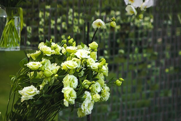 flowers in a restaurant served table Basket with flowers kibana wedding floristry