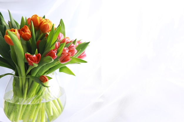 Flowers, spring holidays and home decor concept - Bouquet of beautiful tulips, floral background