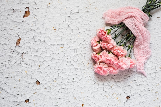 Flowers on white background. Flat lay, top view