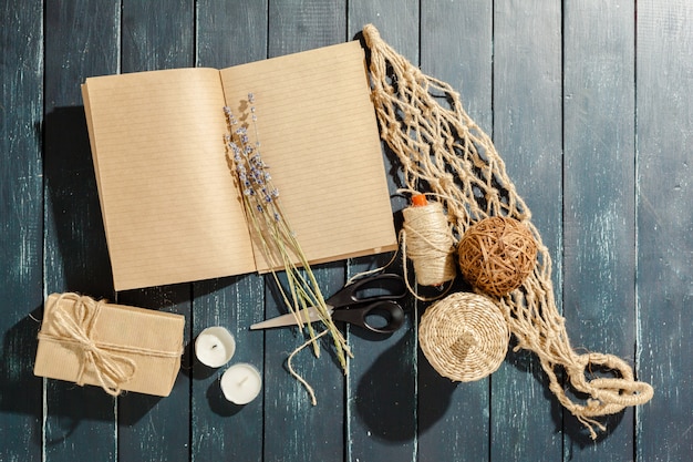  flowers with empty vintage notebook for your