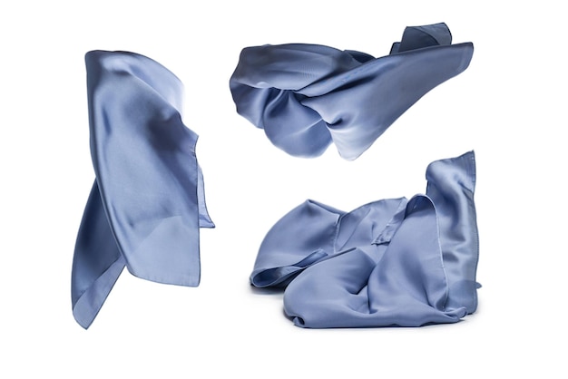 Flowing blue silk scarf isolated on white background