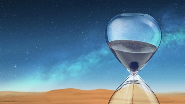 Flowing sand in the hourglass