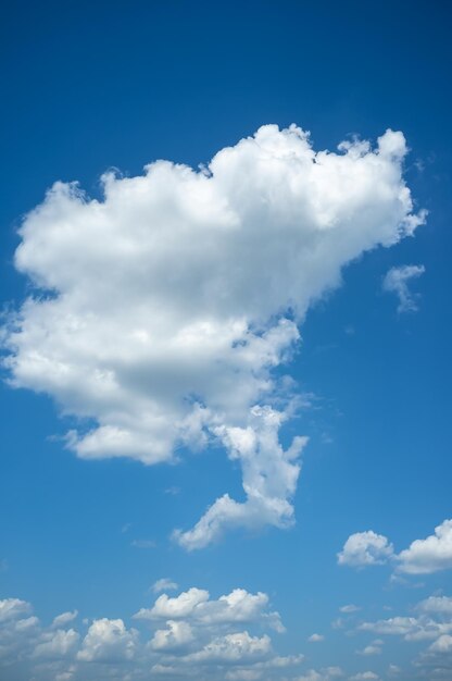 Fluffy white clouds and blue sky