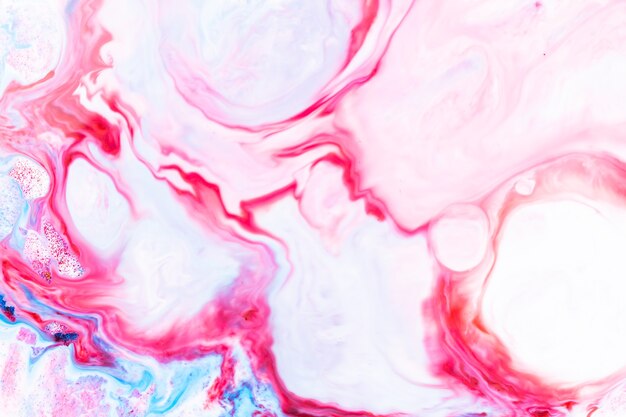Fluid art. Abstract colorful background, wallpaper. Trendy colorful backdrop