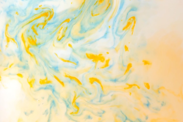 유체 예술 액체에 페인트의 노란색 파란색 추상 배경 파란색 노란색 패턴