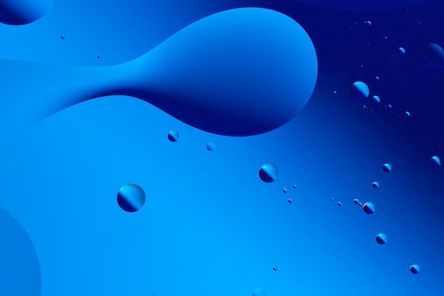 fluid blue shapes and bubbles create an abstract serene underwaterlike scene with smooth and flowing patterns