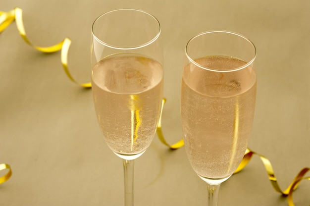 Flutes of golden bubbly champagne