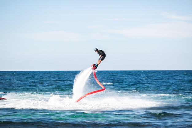 Fly board rider in the ocean