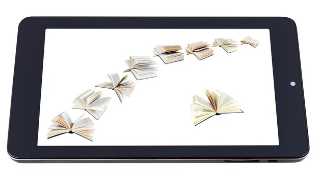 Flying books on display of tablet pc isolated