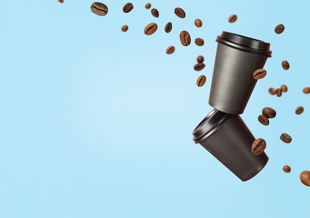 写真 飛んでいるコーヒー豆と紙コップから飛んでいるコーヒー