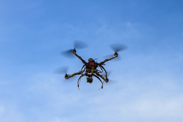 Flying drone on the sky 