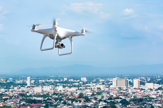 Photo flying drone above town