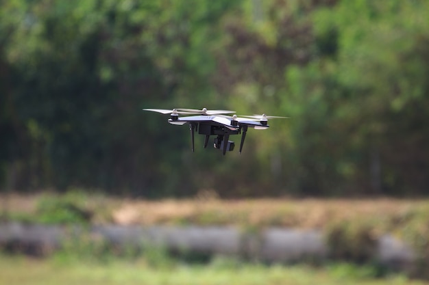 Flying drone with camera on the sky