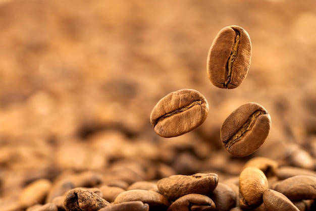 Flying fresh coffee beans as a background