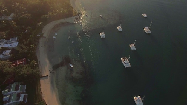 Flying over mauritius coast at sunset